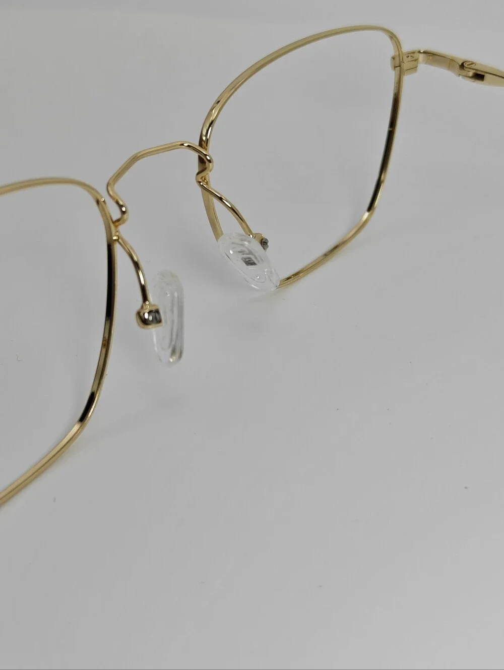 Future. Titanium Eyeglass Temple Arm in Gold. Minimalist Nose Pads.